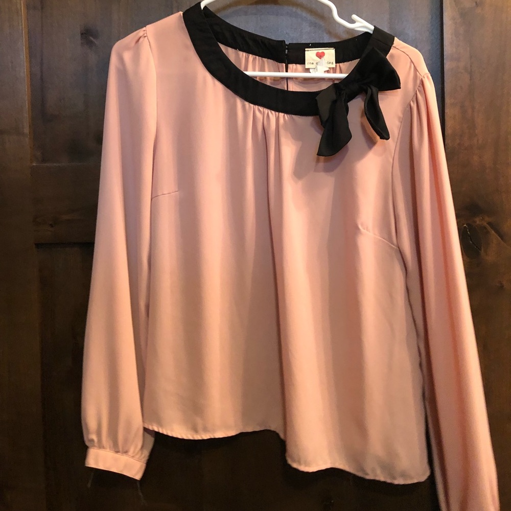 Light pink/nude blouse with black bow